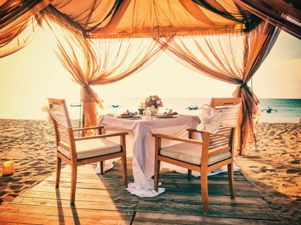 Romantic dinner setting on the beach